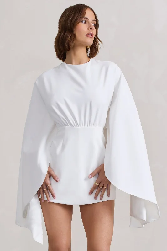 Trendy women’s clothing with a modern twist Presley | White Backless Skort Playsuit With Cape Trendy women’s clothing with a modern twist Presley | White Backless Skort Playsuit With Cape